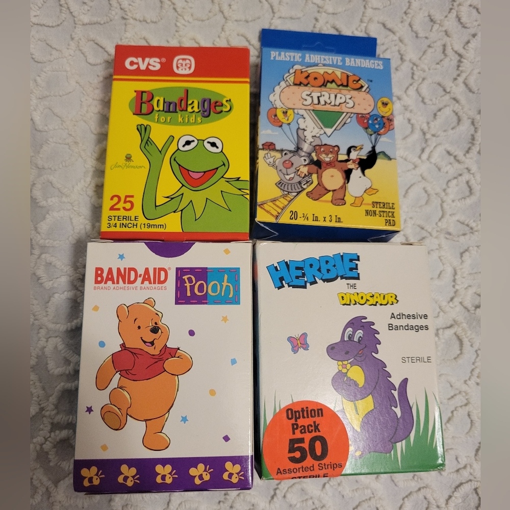 Band Aid Lot Of 4 Winnie The Pooh Herbie The Dinosaur Komic Strips